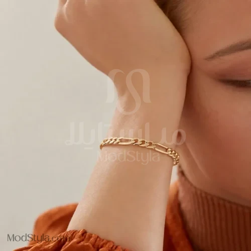 دستبند زنانه ژوپینگ زنجیری طرح فیگارو طلایی روی مچ